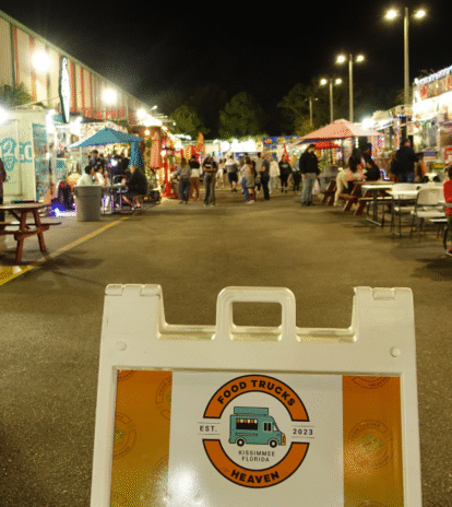 A food truck serving food with a busy crowd outside, highlighting the operation of food trucks.